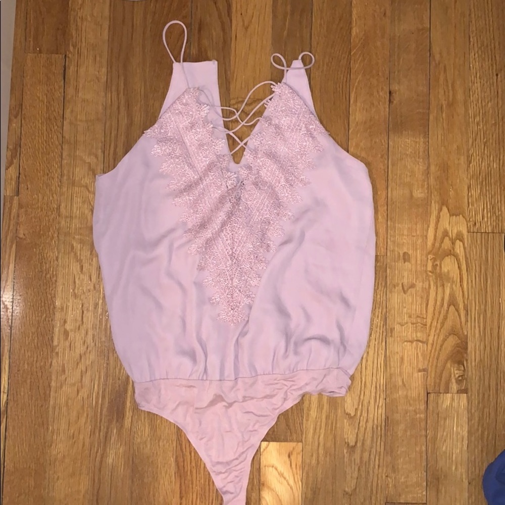 Body suit with lacy front
